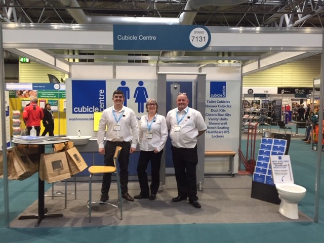 Cubicle Centre Staff standing in front of their exhibition stand