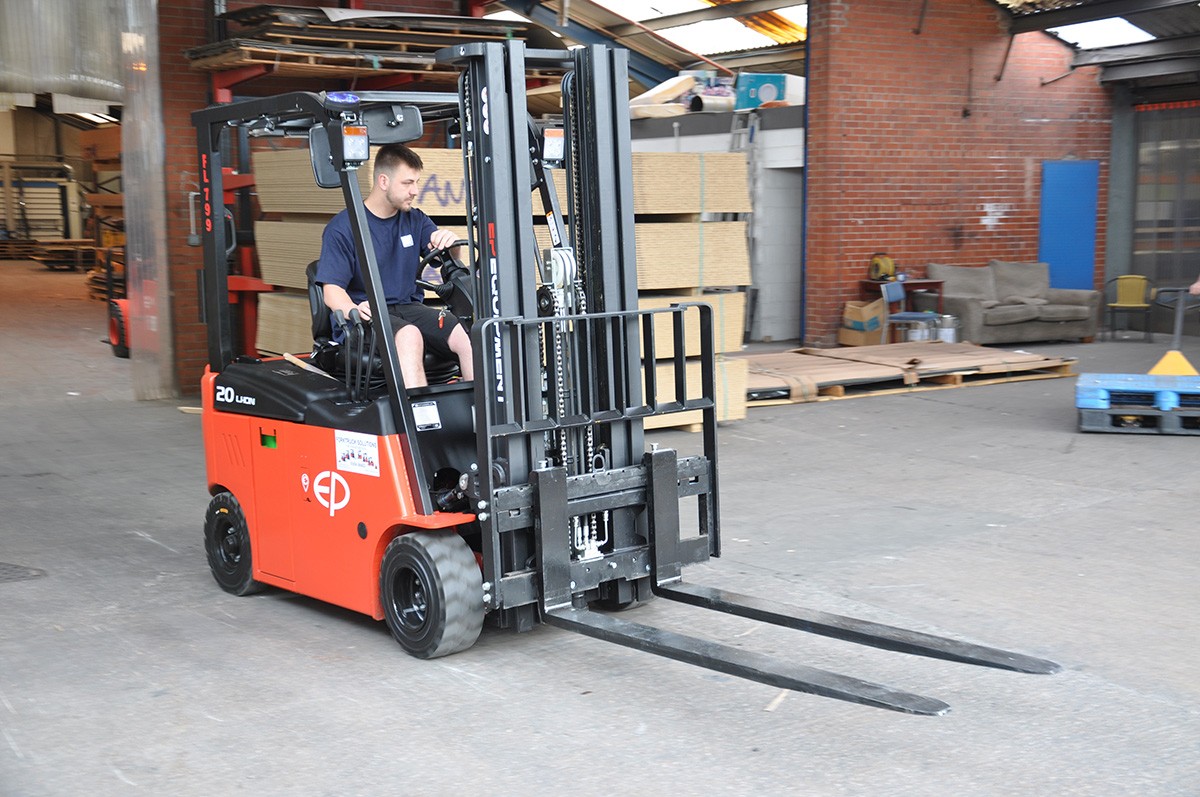 Ash Driving New Forklift