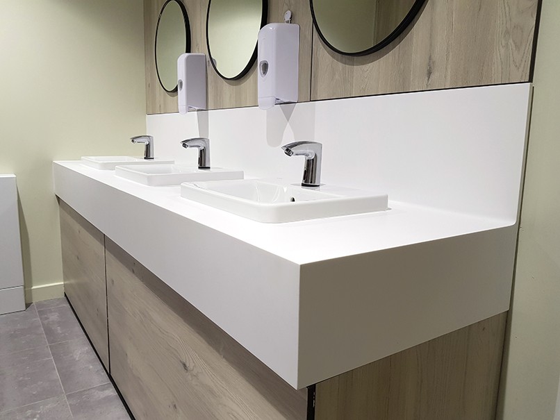 Corian vanity unit with inset basins